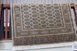 Green ground Bokhara rug 1.90 by 1.