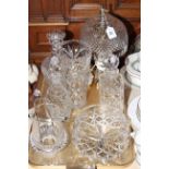 Seven pieces of crystal glassware including table lamp, decanters, ice buckets,