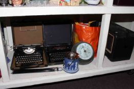Vintage radio, two vintage typewriters, assorted cameras,