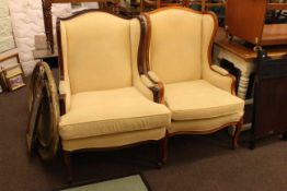 Mahogany and walnut finish upholstered wing back armchairs (2)