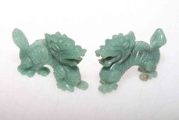 Two small carved green hardstone models of dragons
