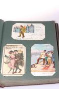 Album of needlework, comical and other postcards including WWI scenes,