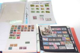 Three albums of World stamps