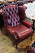 Ox blood deep buttoned wing chair