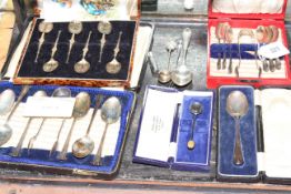 Three cased sets of silver teaspoons,