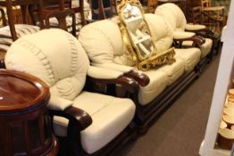 Mahogany show wood framed and cream leather three piece lounge suite