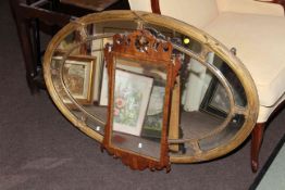 Regency gilt-composition oval mirror and a Georgian fretwork mirror (2)