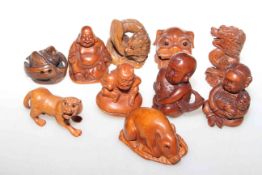 Collection of ten carved wood netsuke,