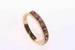 18 carat gold, ruby and diamond half eternity ring,