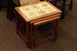 Set of three teak and tiled top nesting tables