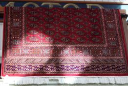 Red ground Bokhara rug 1.90 by 1.