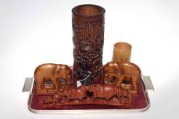 Collection of carvings including bamboo vase, elephant bookends and bridge,