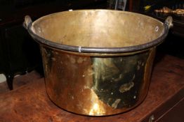 Large Victorian brass log bin with cast metal swing handle