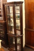 Double height glazed display cabinet