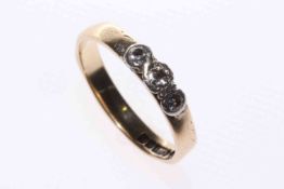 9 carat gold and three-stone diamond ring,