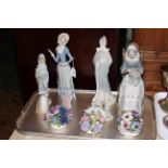 Four Lladro and two Nao figures,