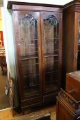 Arts & Crafts oak bookcase cabinet, with Mackintosh style leaded and stained glass,
