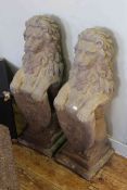 Pair of composite stone models of heraldic lions,