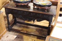 Late Victorian carved oak side table,