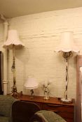 Two onyx standard lamps and shades,