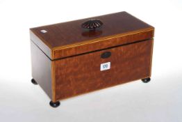 Victorian mahogany and satinwood banded tea caddy with fitted interior raised on bun feet