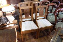 Set of four oak and pollard oak dining chairs in the Yorkshire Craftsmen style