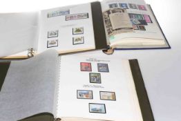 Collection of unmounted mint GB stamps in three albums,