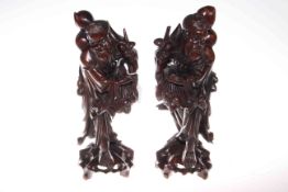 Pair of Chinese carved wood figures of bearded men with watermelon and fruits,