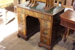 Rosewood kneehole desk in Georgian style, with gilt-tooled leather inset top, 87.
