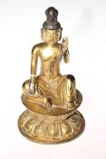 Gilt bronze seated Oriental figure