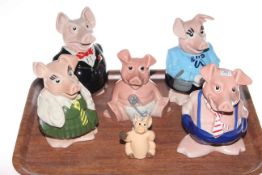 Family of five Wade Natwest pigs and Piggin Pocket Money