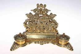 Ornate cast brass desk stand