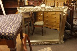 As new overmantel mirror in silvered frame,