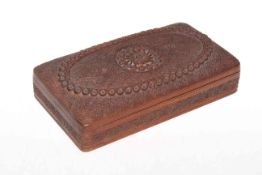 Indian carved hardwood box, carved with flower heads and dense ground of scrolling foliage,