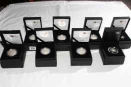 Eight Royal Mint £5 silver proof coins