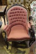 Victorian mahogany framed armchair in buttoned fabric