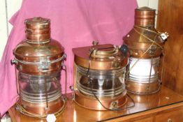 Three copper ships lamps 'Not Under Command', 'Masthead' and 'Anchor',