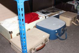 Suitcase of linen, two vanity cases,