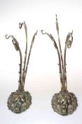An unusual pair of 19th Century bronze three branch wall brackets