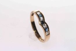 9 carat yellow gold V-shaped channel set sapphire and cubic zirconia ring,