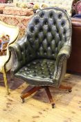 Green deep buttoned and studded leather swivel desk chair