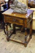 Period style oak occasional table on turned legs and with frieze drawer,