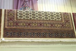 Bokhara carpet with a beige ground 2.80 by 2.