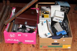 Two boxes of camera equipment including Minolta SLR 7000 and XD5 cameras, assorted lenses,