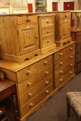 Pair waxed pine five drawer chests,