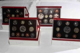 Four Royal Mint Proof coin sets, 2002, 2003,
