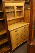 Pine cabinet having two glazed doors above five drawers and oak dresser rack (2)