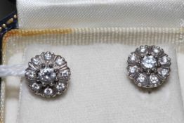 Pair of 18 carat gold and diamond stud earrings