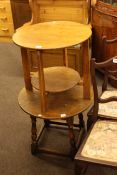 Two circular oak occasional tables