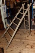 Vintage wooden extending ladder with eleven rungs